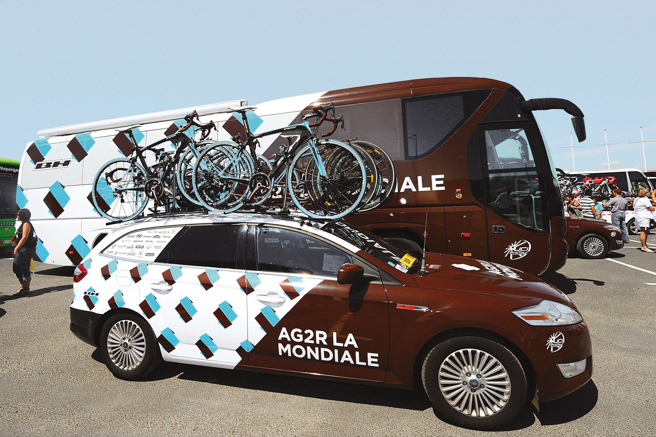 studio dumbar design visual brand identity AG2R LA MONDIALE French insurance company tour de france racing team bicycle and uniform design vehicle and bus design