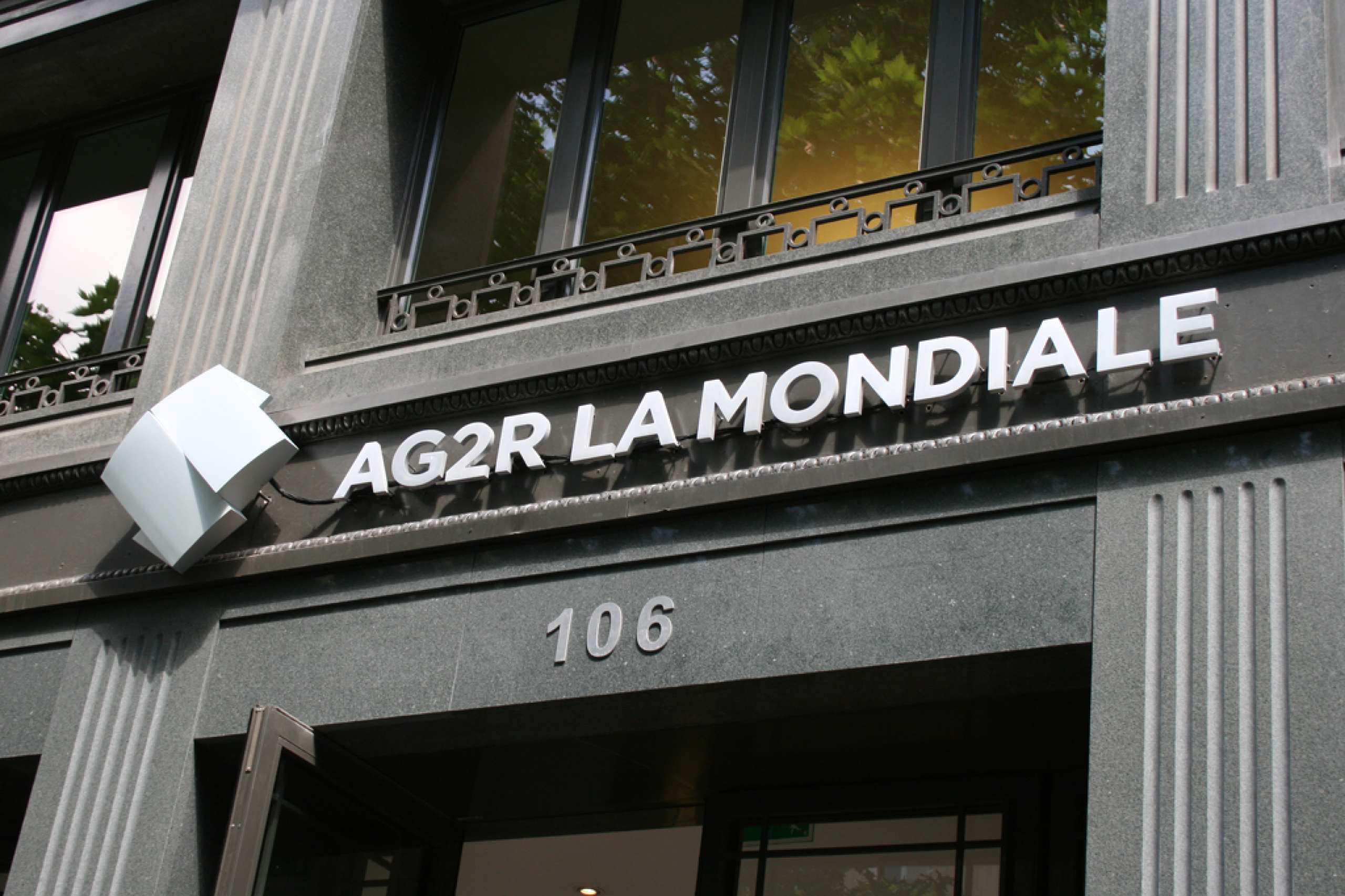 studio dumbar design visual brand identity AG2R LA MONDIALE French insurance company exterior signage logo design