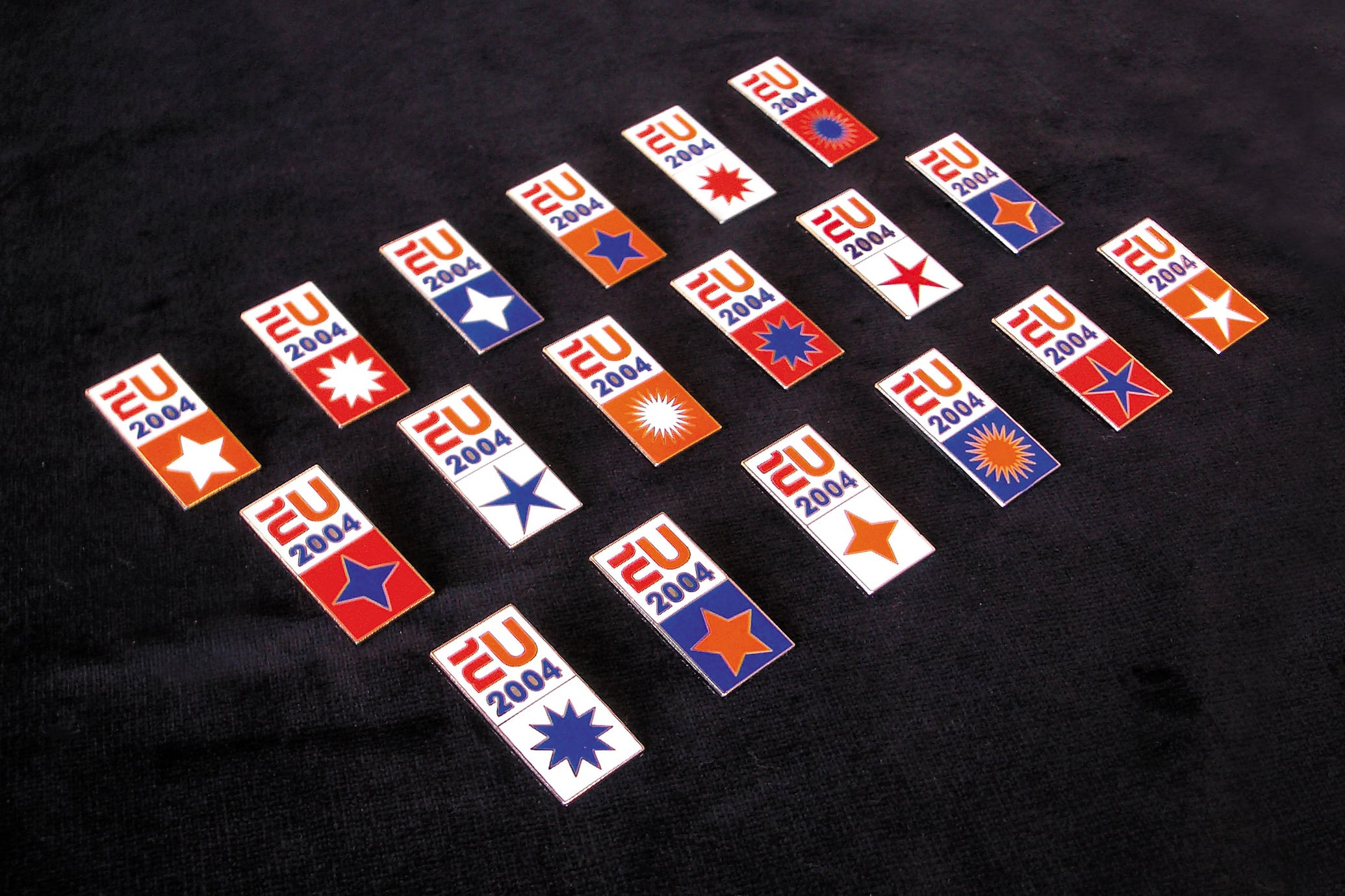 studio dumbar design visual brand identity for EUNL the European logo and event style for the Dutch Presidency of the European Union pin design 2004