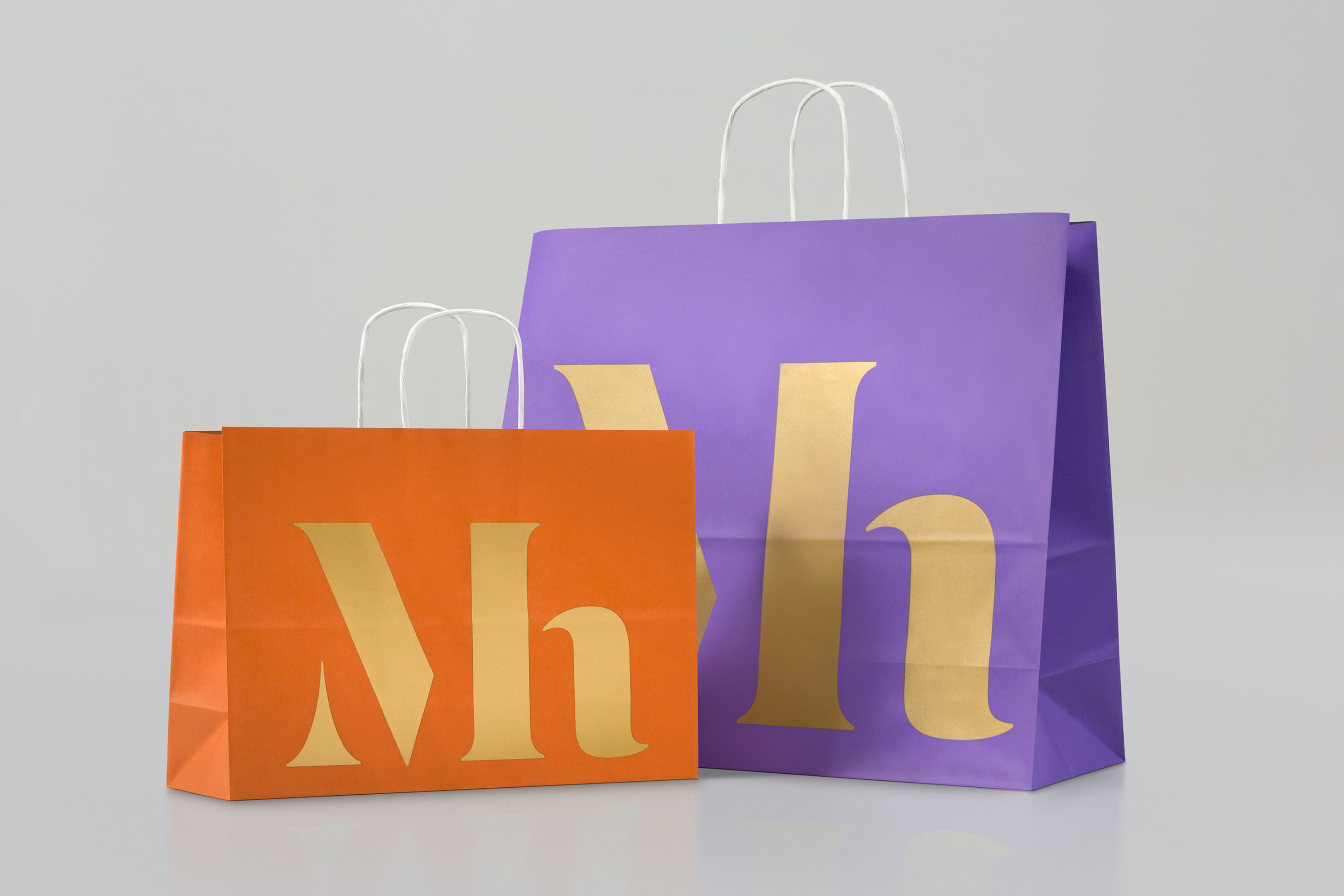 studio dumbar design visual brand identity for Mauritshuis Royal Picture Gallery paper gift bags design with monogram